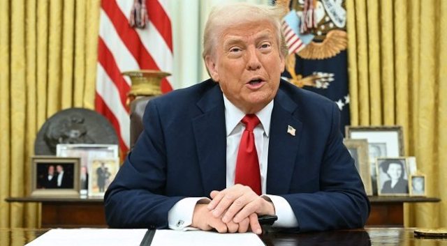 Donald-Trump-signs-an-executive-order-alongside-US-singer-Kid-Rock-__TopshotUsPoliticsTrump-2-e1743495285569
