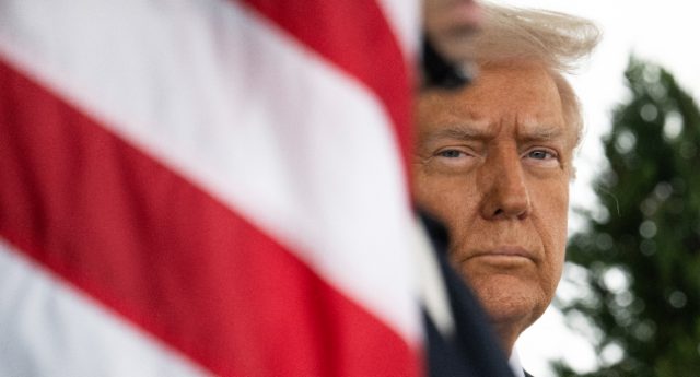 US-President-Donald-Trump-waits-outside-of-the-West-Wing-before-welcoming-King-Abdullah-II-of-Jordan