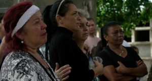 Venezuela Begins Burial Of Quake Victims, Key Port Opens With US Aid Relatives-of-victims-of-the-June-24-twin-earthquakes-pay-last-respects-during-their-burial-at-the-Ce