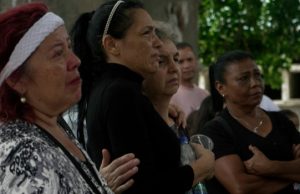Venezuela Begins Burial Of Quake Victims, Key Port Opens With US Aid Relatives-of-victims-of-the-June-24-twin-earthquakes-pay-last-respects-during-their-burial-at-the-Ce