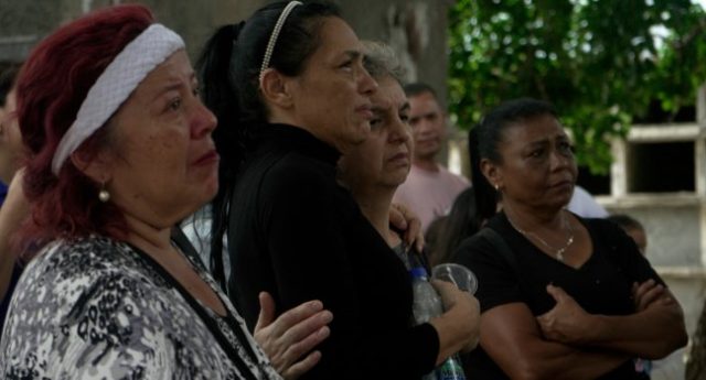 Relatives-of-victims-of-the-June-24-twin-earthquakes-pay-last-respects-during-their-burial-at-the-Ce
