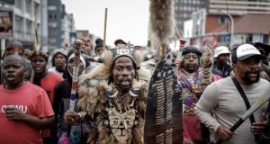 Xenophobia: South Africa Suffers Labour Drought After Migrants’ Exodus Members-of-the-Zulu-regiment-known-as-the-‘Amabutho-chant-slogans-as-they-march-during-a-demonstrat (1)