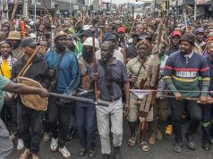 FG to seek compensation for returning Nigerians from South Africa – Envoy Members of the Zulu regiment known as the ‘Amabutho’ chant slogans as they march during a demonstration by the "March and March" movement marking an unofficial deadline set by citizen-led groups for undocumented foreign nationals to leave South Africa, in Durban, on June 30, 2026. Thousands of demonstrators massed across South African cities on June 30, 2026, venting anger at undocumented foreign nationals as police mounted a major operation to head off looting and xenophobic violence that has claimed four lives. The nationwide protests cap weeks of demonstrations called by a loose coalition of minor political parties and small citizen-led vigilante groups, which set an unofficial June 30 deadline for foreigners without residency papers to leave. (Photo by RAJESH JANTILAL / AFP)