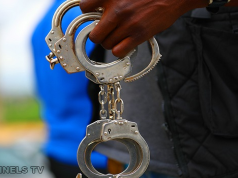 Police Arrest Masquerade Over Murder Of 24-Year-Old In Oyo handcuffs (1)