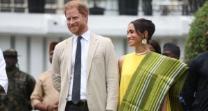 Prince Harry, Meghan Moving Back To UK Britains-Prince-Harry-Duke-of-Sussex-and-his-wife-Meghan-Duchess-of-Sussex-react-as-Lagos-Stat