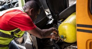 Subsidy Removal: Tinubu Directs Rollout Of Additional 500 CNG Stations Jide Fashetire, Founder of City Mechanic, sets up a gas bottle in a mini bus to convert it to gas combustion in City Mechanic, a Compressed Natural Gas (CNG) center Lagos, on November 12, 2024. (Photo by OLYMPIA DE MAISMONT / AFP)