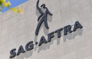 New California Law Mandates AI Performer Disclosure In Ads (FILES) The SAG-AFTRA building, home to the US labor union that represents film and television actors, singers, and other performers, is seen in Los Angeles, California, on July 13, 2023. - union representing striking actors said November 6, 2023 it could not agree to studios' "last, best and final offer" issued over the weekend in a bid to end a months-long stalemate that has crippled Hollywood. Negotiators for the Screen Actors Guild (SAG-AFTRA) have been mulling the proposal since November 4, as studios seek to halt a damaging stoppage that has brought TV and movie production to a standstill for four months. (Photo by Chris Delmas / AFP)