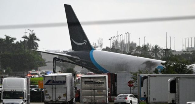 The-tail-section-of-a-cargo-plane-is-seen-at-Miami-International-Airport-after-it-overran-the-runway