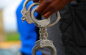 Police Arrest Suspected Kidnappers, Four Informants In Kaduna handcuff-